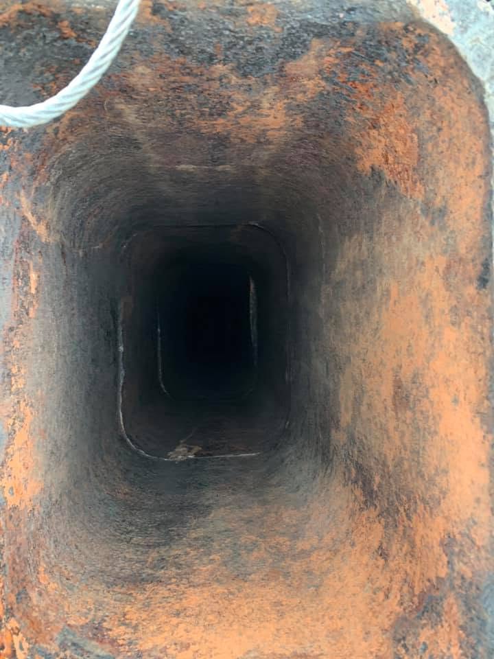 Clean chimney flue after professional chimney sweeping removed creosote and soot buildup.